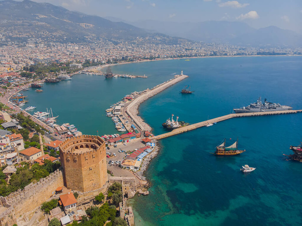 Kizil Kule or Red Tower and port aerial panoramic view in Alanya city, Antalya Province on the southern coast of Turkey. Summer photo taken from a drone - Φωτογραφία, εικόνα