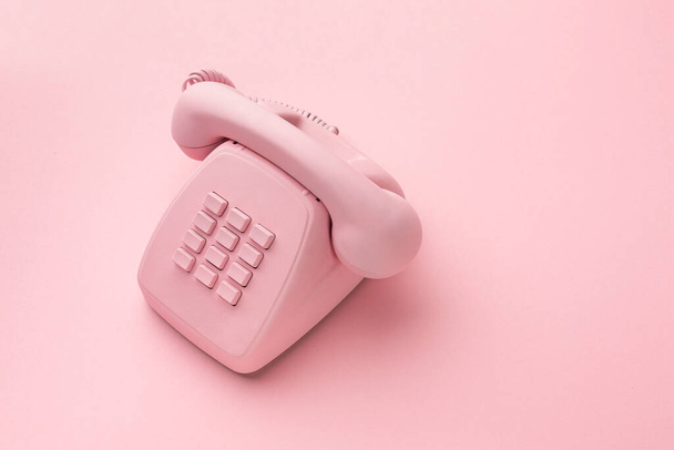 vintage phone on color background. High quality photo - Foto, afbeelding