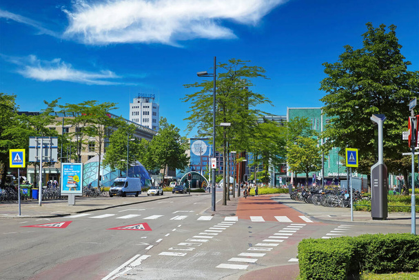 Eindhoven (Piazza), Netherlands - July 17. 2022: Dutch shopping square street with modern architecture buildings in city center, blue summer sky - Φωτογραφία, εικόνα