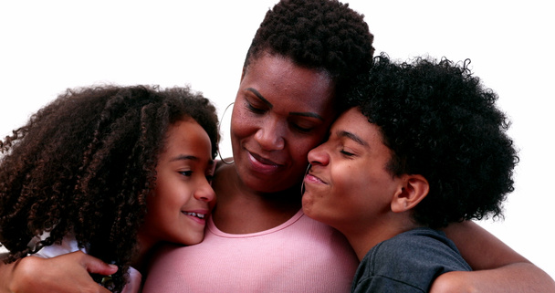 Loving mother and kids hug. Mom embracing children. African ethnicity - Valokuva, kuva