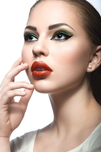 Beautiful woman with evening make-up, red lips. Beauty face. - Foto, Imagem