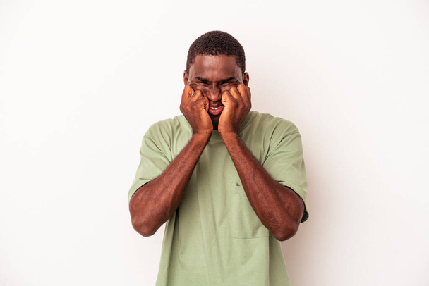 Young African American man isolated on white background whining and crying disconsolately. - Photo, Image