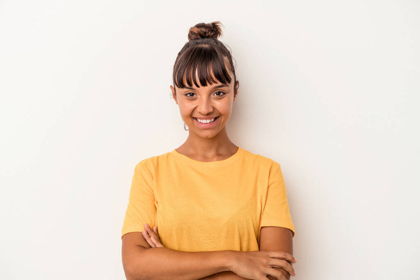 Young mixed race woman isolated on white background  who feels confident, crossing arms with determination. - Φωτογραφία, εικόνα