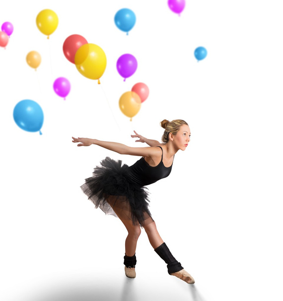 Girl dancing with colorful balloons - Fotografie, Obrázek