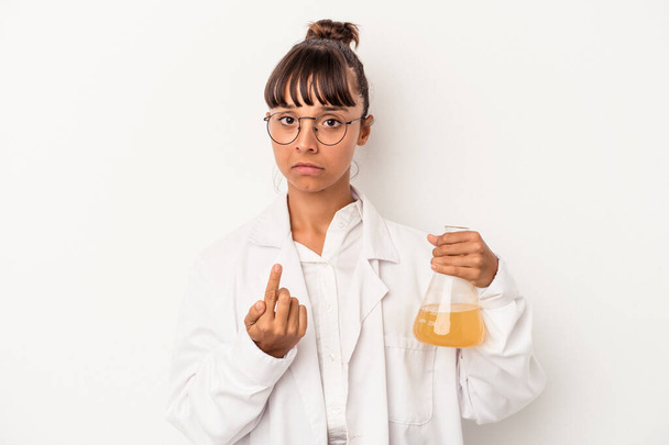 Young mixed race scientist woman holding a test tube isolated on white background  pointing with finger at you as if inviting come closer. - Photo, Image