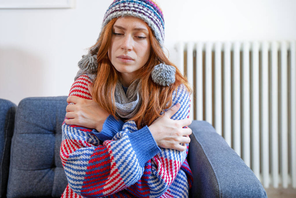 One woman suffering cold at home and gas energy expenses - Zdjęcie, obraz
