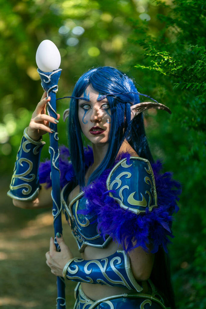 Lucca, Italy - 2018 10 31 : Lucca Comics free cosplay event around city warcraft Night Elf Girl . High quality photo - Foto, immagini