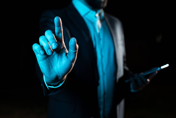 Businessman Pointing Important Infortmations With One Finger. - Φωτογραφία, εικόνα