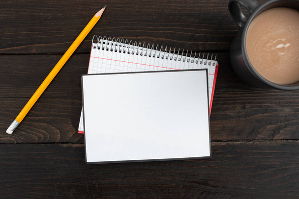 Blank Paper With Stationery And Coffee Presenting Important Information. - 写真・画像