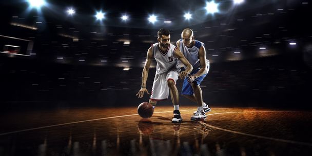 Two basketball players in action - Photo, Image