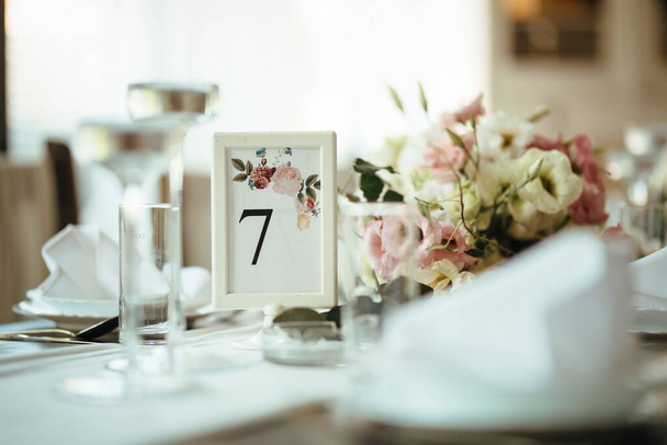 Details on decorated dining table at wedding reception.  - Valokuva, kuva