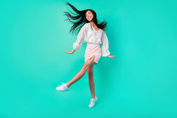 Full length photo of positive cheerful sweet lady dance discotheque active isolated cyan color background. - Photo, Image