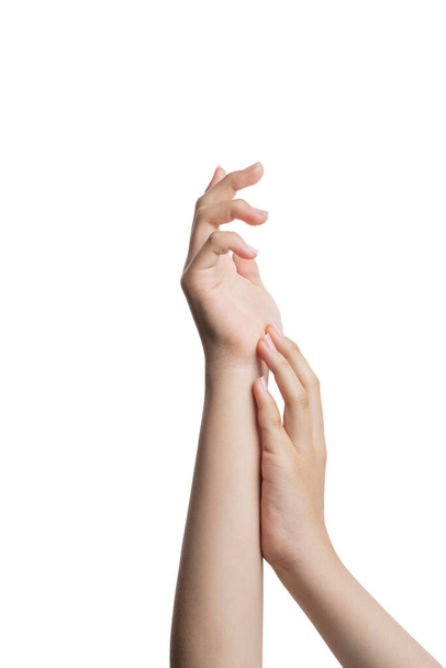 Молоді жіночі руки торкаються один одного, з білим тлом і місцем для тексту
. - Фото, зображення
