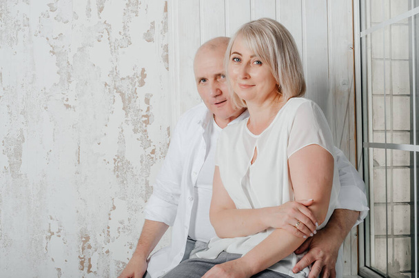 photo session of a man with his wife in a photo studio - Foto, Imagem