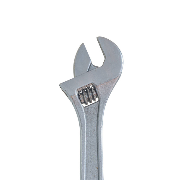 Big metal adjustable wrench isolated at white background. Concept of hardware, gears, and workshop work, details, closeup - Zdjęcie, obraz