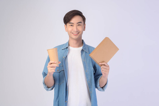 A Young asian man holding paper cup and paper box over white background, Save earth concept - Foto, Imagen