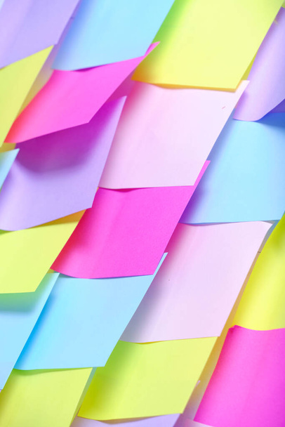Bright, multicolored abstract background made self adhesive paper for notes - 写真・画像