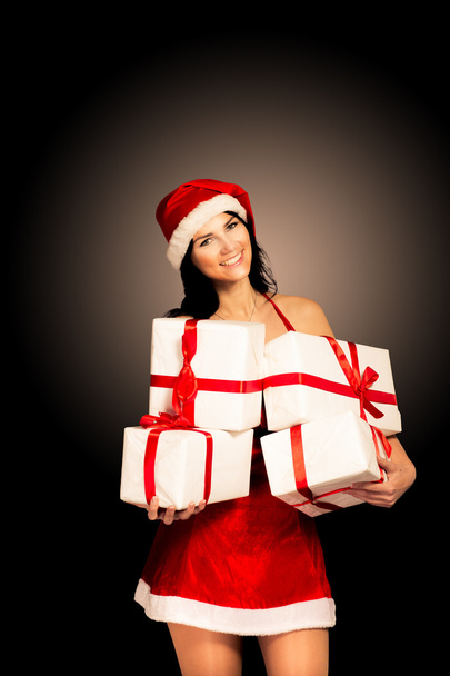 Santa hat Christmas woman holding christmas gifts smiling happy and excited. - Foto, Imagem