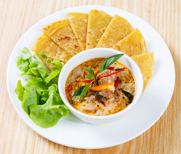 Indian pancake with chicken curry - Photo, Image