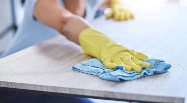 an unrecognizable woman cleaning her apartment. - Foto, Imagem