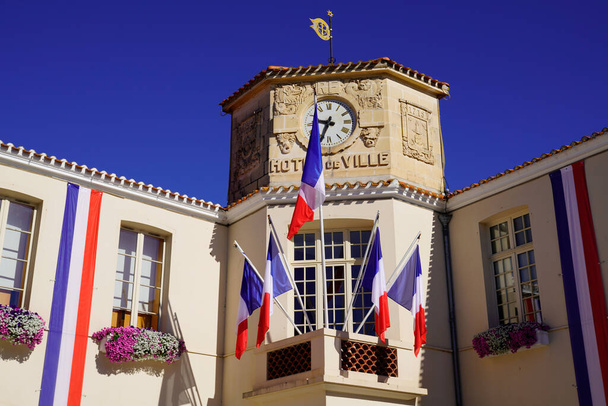 french flag city hall red white blue decoration in facade in town center - Photo, image