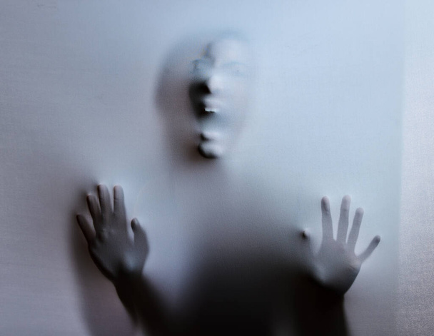 a scary figure confined under a sheet. - Photo, Image