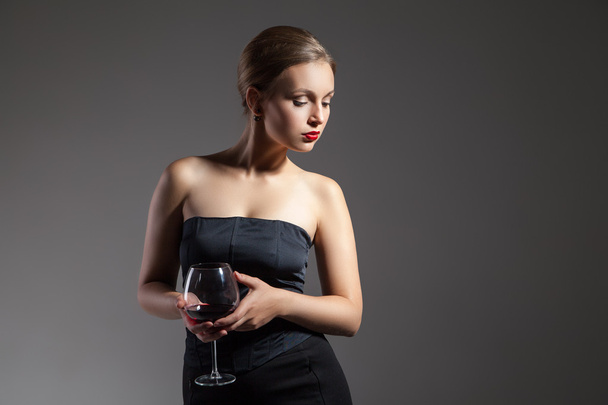 Beautiful woman with wine glass, retro stylization - Φωτογραφία, εικόνα