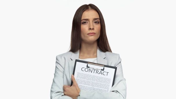 young businesswoman in grey blazer holding clipboard with contract lettering isolated on white - Foto, Imagem
