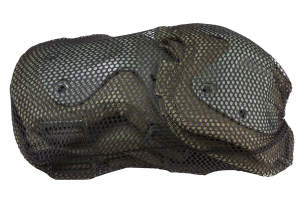 a set of army knee and elbow pads in green, in a mesh case, on a white background, isolate - Photo, Image