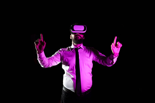 Businessman Using Virtual Reality Simulator And Gesturing During Training. - 写真・画像