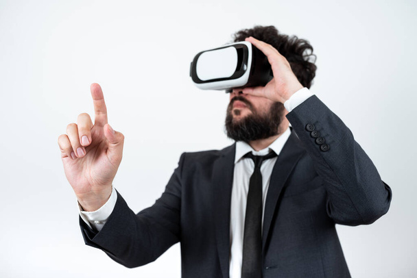 Man Wearing Vr Glasses And Pointing On Important Messages With One Finger. - Foto, Bild