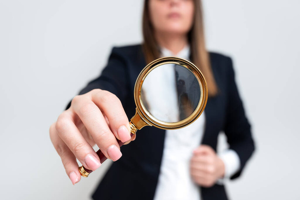 Woman Having Magnifying Glass To Point Important Information. - Foto, imagen