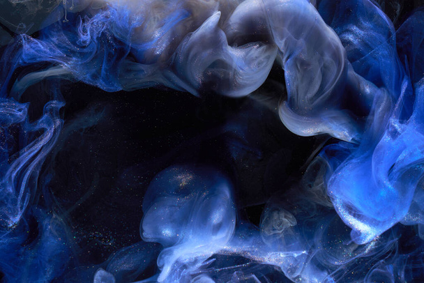 Liquid fluid art abstract background. Blue acrylic paint underwater, galactic smoke ocean - Foto, afbeelding
