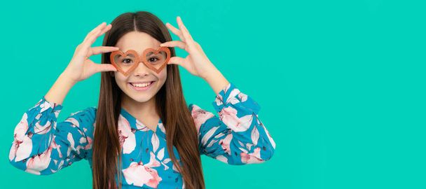 Valentines is near. Funny child wear prop glasses. Happy Valentines day. Funny teenager child on party, poster banner header with copy space - 写真・画像