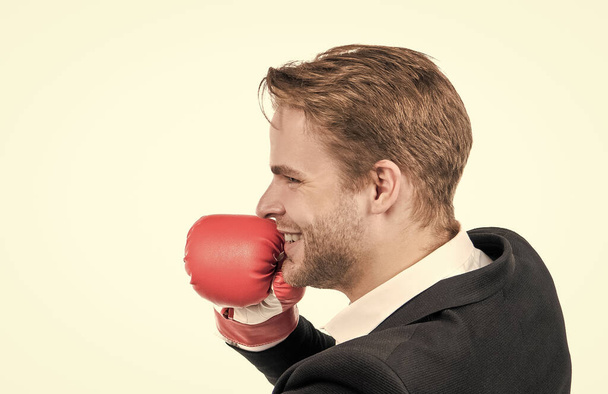 Happy businessman wear boxing glove and business suit isolated on white, fighting man. - Photo, Image