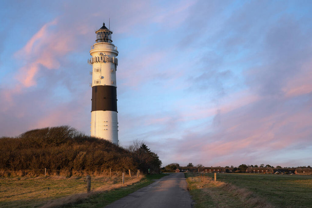 Panoramic image of Kampen lighthouse against sky, Sylt, North Frisia, Germany  - Photo, Image