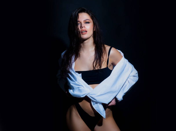 Beautiful sensual woman fashion model. Sexy female posing in studio - Valokuva, kuva