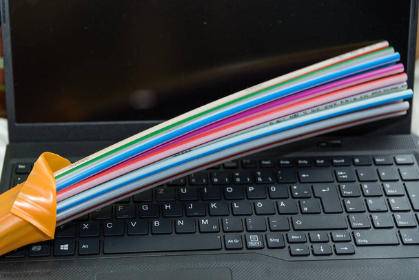 Pulses of light over fiber optic cable - fast internet, fiber optic connection and laptop - Valokuva, kuva