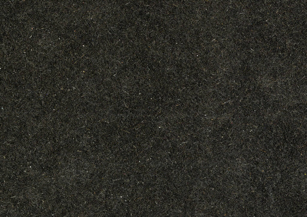 High resolution highly detailed large image of an paperboard carton uncoated paper texture background black with large rough grain fiber and white dust particles wallpaper with copy space for text - Fotó, kép