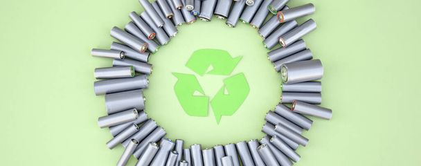 Використовуються батареї AA та належне утилізація екологічних та ґрунтово-токсичних батарей на зеленому тлі. Концепція обробки шкідливих та перероблюваних об'єктів
. - Фото, зображення