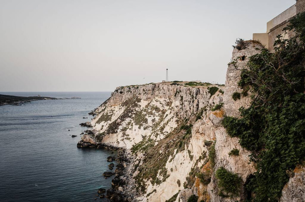 Italy, July 2022: architectural details, at sunset, on the island of San Nicola Isole Tremiti - 写真・画像