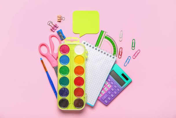 Different school stationery on pink background - Foto, immagini