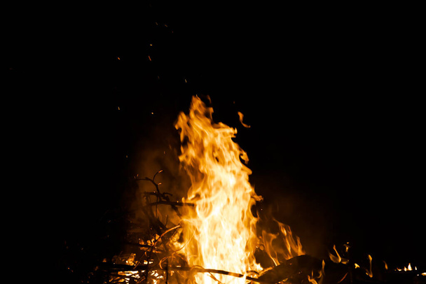 Fire flames on black background. fire burst texture for banner backdrop. - Foto, afbeelding