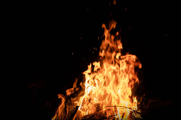 Fire flames on black background. fire burst texture for banner backdrop. - Photo, Image