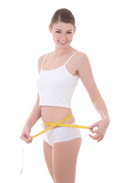 concepto de dieta - sonriente a mujer con hermoso cuerpo midiendo su w - Foto, Imagen