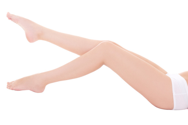 jambes longues femmes isolés sur blanc - Photo, image