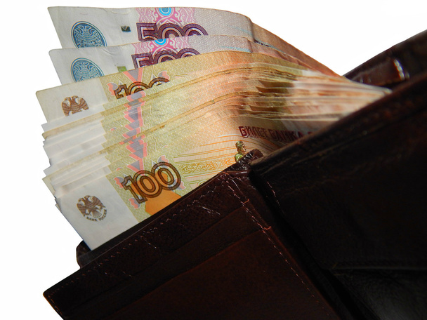 As notas de banco russas em uma bolsa
 - Foto, Imagem