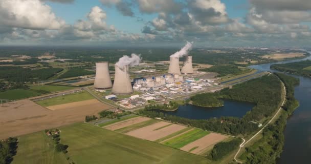 Aerial view to nuclear power plant in France. Atomic power stations are very important sources of electricity with low carbon footprint. Aerial view to big source of emissions in European Union. - Кадры, видео