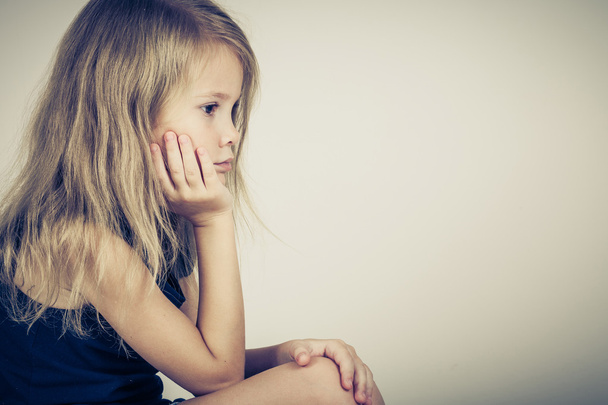 Portrait of sad blond little girl - Valokuva, kuva