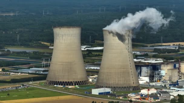 Aerial view to nuclear power plant in France. Atomic power stations are very important sources of electricity with low carbon footprint. Aerial view to big source of emissions in European Union. - Кадры, видео